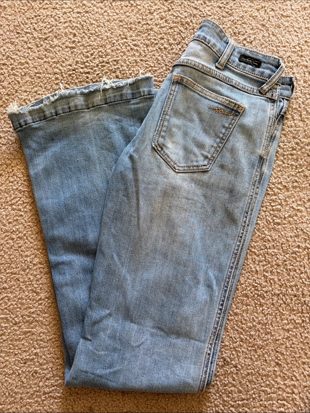 Light Wash Flared Jeans with Frayed Hem - Unknown Brand